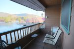 Living Room Access Patio with Mountain and Water Views at Deer Park Condo